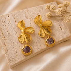 Gold Floral Orchid Earrings With Dangling Amethyst Detail